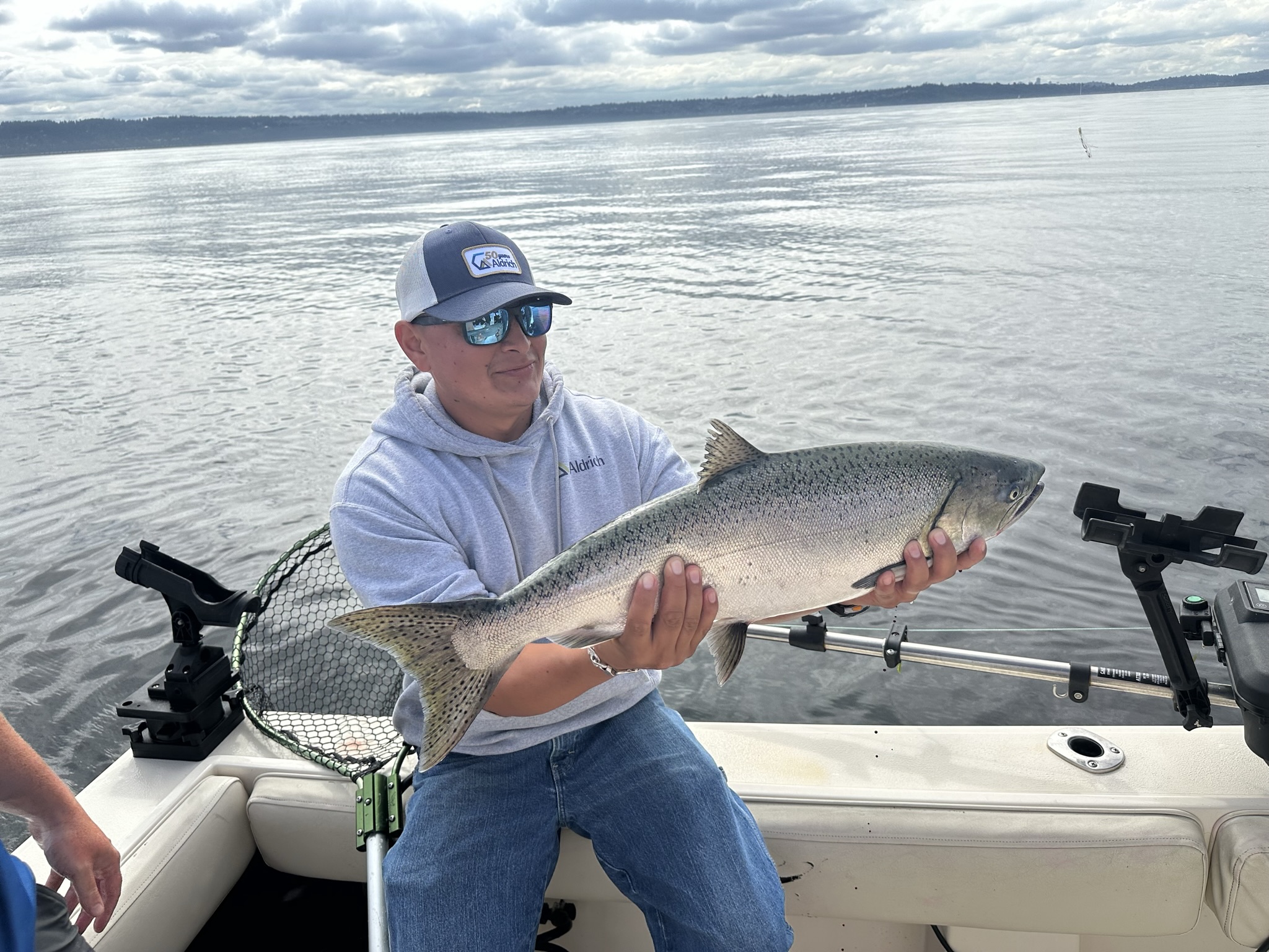 Christian Sanchez caught a healthy-sized salmon during Aldrich's 2023 fishing excursion. img_4607.jpeg